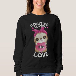 Valentine's day sloth with pink heart for her sweatshirt