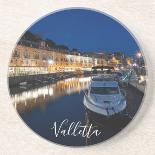 Valletta waterfront district with small harbor coaster