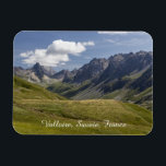 Valloire Mountains Summer Landscape, France Magnet<br><div class="desc">This mountain landscape in Valloire, Savoie, France is a beautiful capture of an alpine landscape in the French Alps. The lush green rolling hills, and majestic mountain range create a captivating view. The summits of Aiguilles d'Arves can be see to the left under a clear blue sky. Great souvenir of...</div>