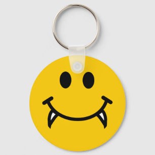 Vampire smiley face with fangs key ring