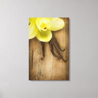 Vanilla Pods and Flower over Wooden Background