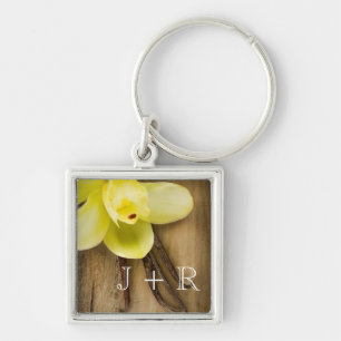 Vanilla Pods and Flower over Wooden Background Key Ring