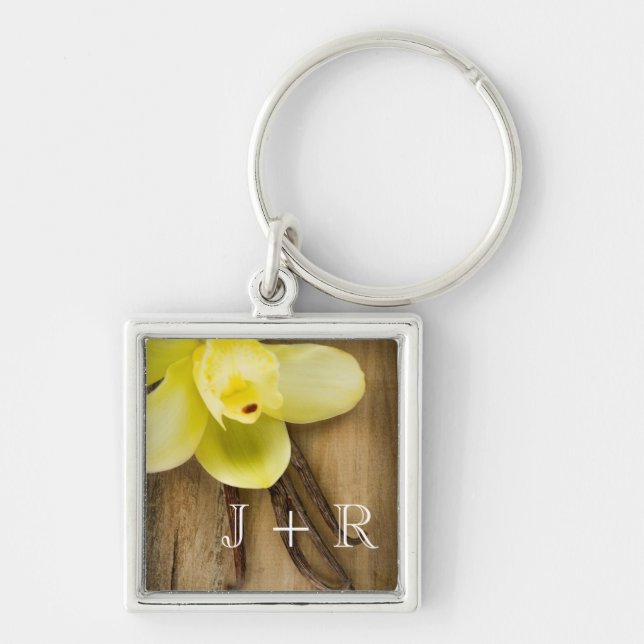 Vanilla Pods and Flower over Wooden Background Key Ring (Front)