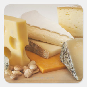 Various cheeses on chopping board square sticker