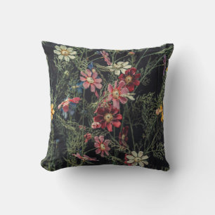 Various flowers on the black wooden background. Ab Cushion