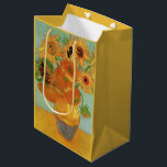 Vase with Twelve Sunflowers by Vincent van Gogh Medium Gift Bag<br><div class="desc">Still Life: Vase with Twelve Sunflowers by Vincent van Gogh is a vintage fine art post impressionism still life floral painting. A beautiful summer bouquet with a dozen sunflower flowers fresh from the garden. Part of a series of sunflowers that van Gogh did in various states. About the artist: Vincent...</div>