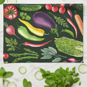 Vegetable and herbs garden harvest on black tea towel