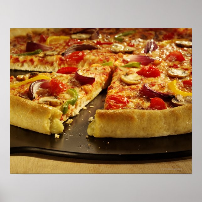 Vegetable pizza sliced on black pan on wood poster (Front)