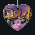 Venice, Italy Scenic Canal & Venetian Architecture Ceramic Tree Decoration<br><div class="desc">An ornament with a beautiful scenic landscape photo of a canal in Venice,  Italy. With dark purple clouds,  looks like a storm is coming. Great capture of the unique venetian architecture and watery reflections.
Customisable text says: Venice with a little heart above.</div>