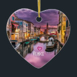 Venice, Italy Scenic Canal & Venetian Architecture Ceramic Tree Decoration<br><div class="desc">An ornament with a beautiful scenic landscape photo of a canal in Venice,  Italy. With dark purple clouds,  looks like a storm is coming. Great capture of the unique venetian architecture and watery reflections.
Customisable text says: Venice with a little heart above.</div>