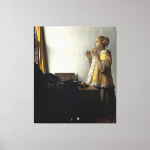 Vermeer's Young Woman with a Pearl Necklace (1662) Canvas Print