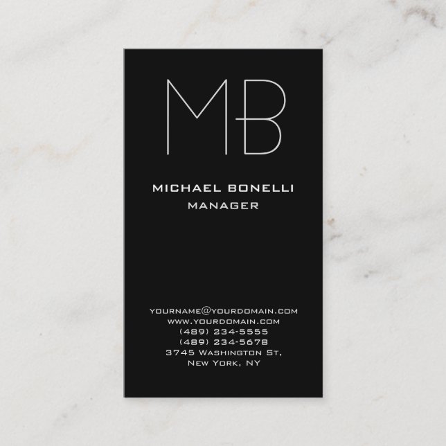 Vertical black white monogram business card (Front)