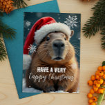 Very Cappy Christmas Capybara Christmas Holiday Postcard<br><div class="desc">Send some Capy Christmas cheer this holiday season with this funny Christmas card featuring everyone’s favourite chill animal – the capybara! Decked out in a festive Santa hat and surrounded by snowflakes, this card brings an extra dose of humour to your holiday greetings. Perfect for adding a quirky touch to...</div>