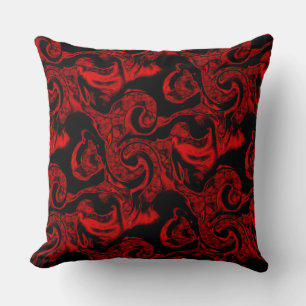 Very stained red spiral parts on black background cushion