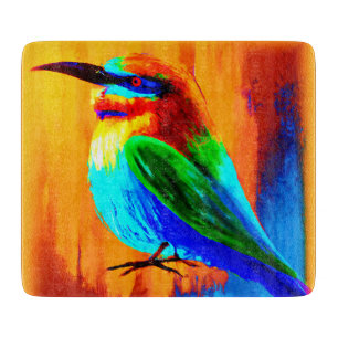 Vibrant and Joyful Rainbow Bird Painting. Buy Now Cutting Board