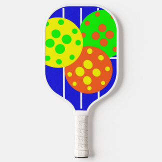 Vibrant colours of pickleballs & court paddle. pickleball paddle