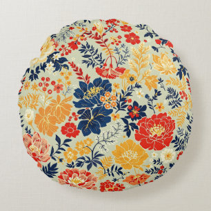 Vibrant flora red, yellow and blue on white round cushion