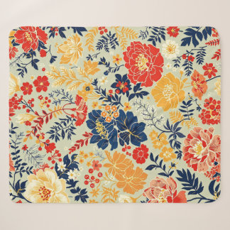 Vibrant flora red, yellow and blue on white sherpa blanket