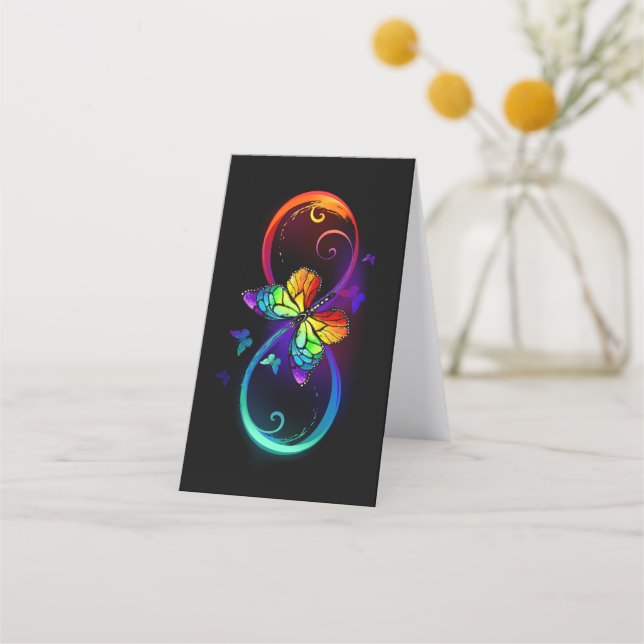 Vibrant infinity with rainbow butterfly on black appointment card (Back)