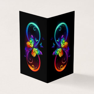 Vibrant infinity with rainbow butterfly on black business card
