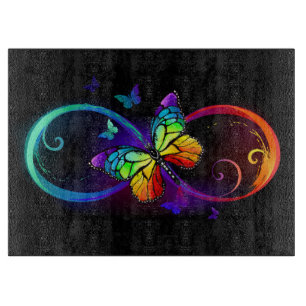 Vibrant infinity with rainbow butterfly on black cutting board