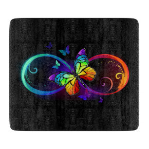 Vibrant infinity with rainbow butterfly on black cutting board