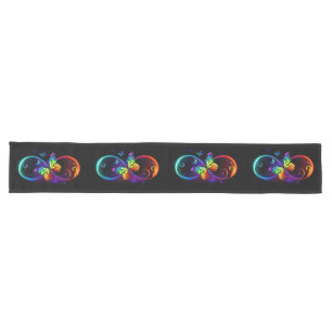 Vibrant infinity with rainbow butterfly on black long table runner