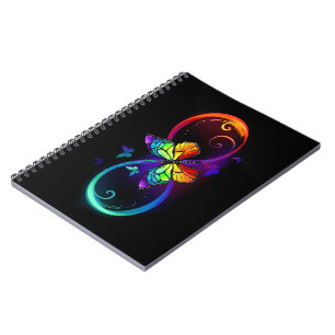 Vibrant infinity with rainbow butterfly on black notebook