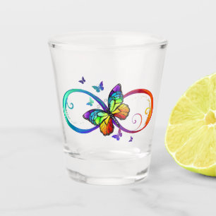 Vibrant infinity with rainbow butterfly on black shot glass