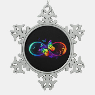 Vibrant infinity with rainbow butterfly on black snowflake pewter christmas ornament