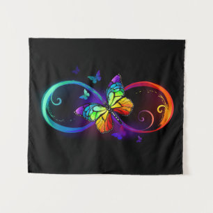Vibrant infinity with rainbow butterfly on black tapestry
