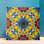 Vibrant Intricate Kaleidoscope Geometric Pattern Tile<br><div class="desc">This ceramic tile features a vibrant and intricate design. At the heart of the tile is a star-shaped pattern, rendered in bold shades of blue. This central motif is surrounded by radiant shapes in a striking yellow hue, adorned with delicate accents in red and green. The design is chraacterised by...</div>