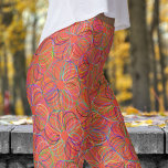 Vibrant Orange Cyclic Chaos Pattern Leggings<br><div class="desc">Vibrant Energy: Step into your power with these Cyclic Chaos leggings! Featuring a bold, colourful design, these leggings are perfect for those who want to stand out. Whether you're hitting the gym or running errands, their unique style and comfortable fit will keep you feeling great. Embrace your bold side—shop now...</div>