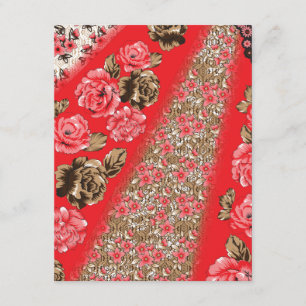 Vibrant red fabric featuring intricate floral and enclosure card