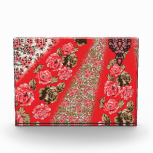Vibrant red fabric featuring intricate floral and photo block