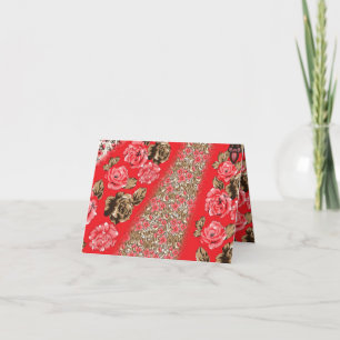 Vibrant red fabric featuring intricate floral and thank you card