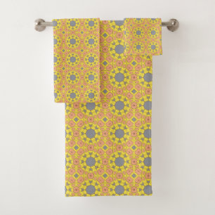 vibrant yellow geometric pattern with blue and red bath towel set