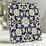 Victorian Sapphire Blue and Ivory Daisy Tile<br><div class="desc">This Victorian-inspired Arts and Crafts design showcases a stunning deep sapphire blue background adorned with soft ivory daisy clusters and intricate swirling tendrils. The hand-painted style and symmetrical floral tracery evoke a timeless antique charm, perfect for elevating backsplashes, accent walls, or decorative installations. With its elegant combination of rich colours...</div>