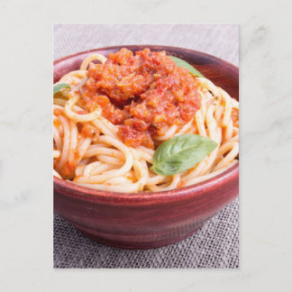 View close-up on a small portion of cooked spaghet postcard
