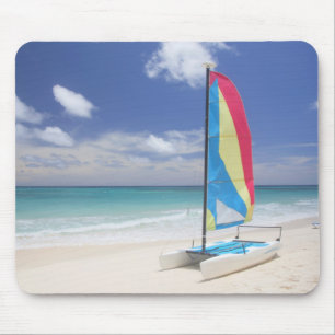 View Of Beach With Sailboat Mouse Pad