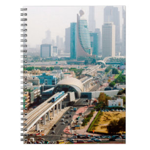 View of city metro line and skyscrapers spiral notebook