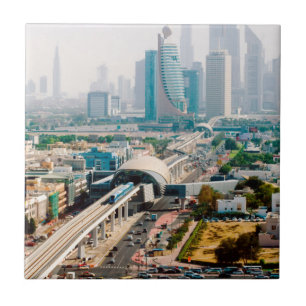 View of city metro line and skyscrapers tile