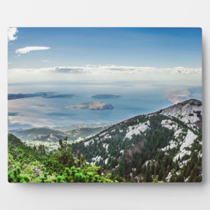 View of sea from mountains plaque