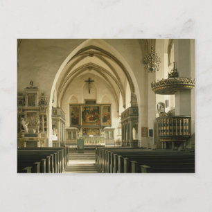 View of the interior of the church with postcard