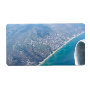 View on the seacoast through the aeroplane window