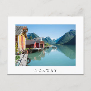 Village and a fjord in Norway white text postcard
