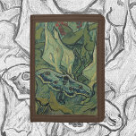 Vincent van Gogh - Great Peacock Moth Tri-fold Wallet<br><div class="desc">Great Peacock Moth (1889) by Vincent van Gogh is a vintage fine art still life post impressionism nature painting. An insect, the Emperor Moth, in a spring garden with Calla Lily flowers and other plants. Van Gogh called it a 'death's-head moth' and painted a skull on the back of its...</div>