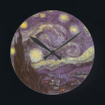 Vincent van Gogh - Starry Night Round Clock<br><div class="desc">Starry Night (1889) by Vincent van Gogh is a vintage post impressionism fine art landscape nature painting. A view of a city in a valley at night with the clouds swirling, the stars shining and a beautiful golden yellow crescent moon. It was painted during the day from memory and is...</div>