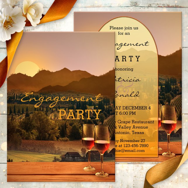 Vineyard Wine Theme Engagement Party Invitation (Engagement party invitation with two glasses of wine on a rustic wood table overlooking a vineyard)