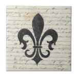 Vintage Accents French Ephemera Fleur De Lis Tile<br><div class="desc">Fleur De Lis against a vintage French Ephemera Design. Perfect for interior tile wall accents,  backsplashes,  fireplace surrounds,  bathroom and showers walls,  kitchens and craft projects. Not intended for outdoor use.  Suggestion: Order one tile to review before placing a large order. (discount available with bulk order)</div>